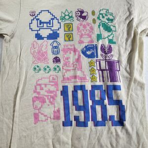 Men's Nintendo Retro Super Mario Bros. "1985" Pastel Tan Graphic T-Shirt Size S